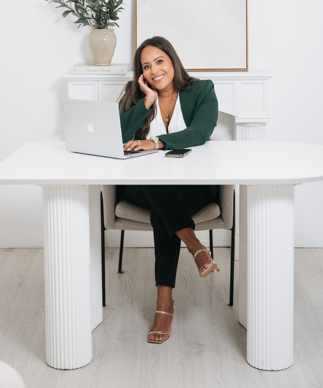 Jasmine Vazquez at her desk