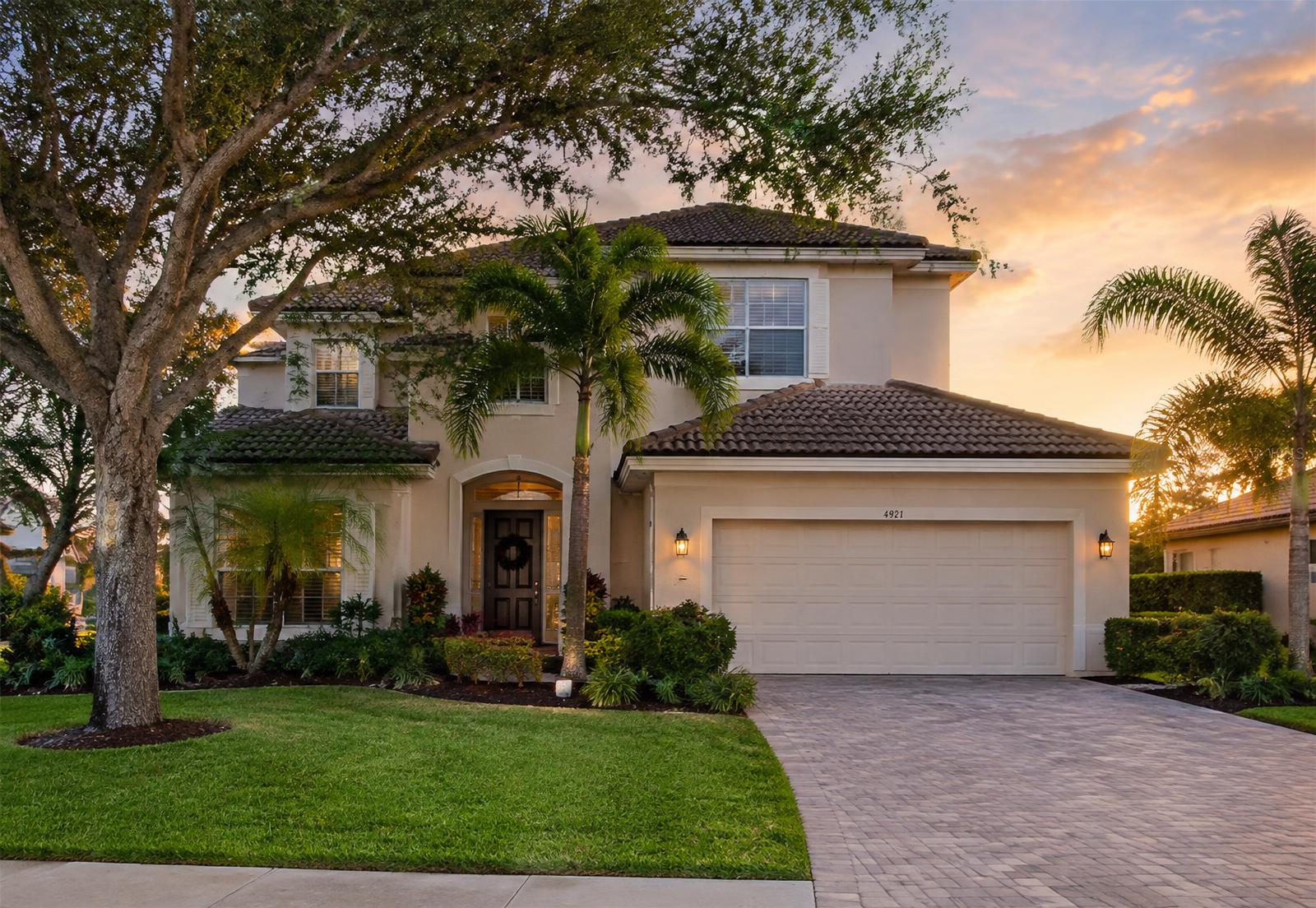 An elevated Central Florida home at sunset